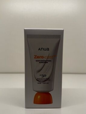 Anua Zero-cast Moisturizing Finish Sunscreen SPF 50 — White with Orange Accent